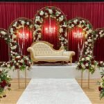 Crimson & Ivory Royal Wedding Stage Décor