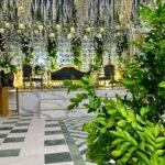 Grand White Floral Stage Décor – Luxury Wedding Setup