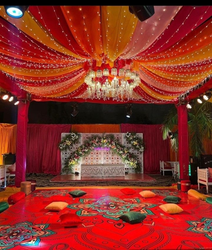 WhatsApp Image 2026-05-29 at 2.12.15 AM Luxury Mehndi Stage Décor & Vibrant Event Setup - Image 1